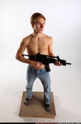 Man Young Athletic White Fighting with submachine gun Standing poses Pants