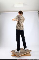 Man Young Athletic White Fighting with gun Standing poses Sportswear