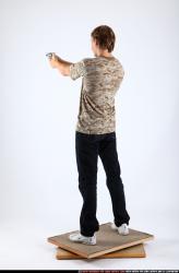 Man Young Athletic White Fighting with gun Standing poses Sportswear