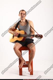 frankie-sitting-playing-guitar