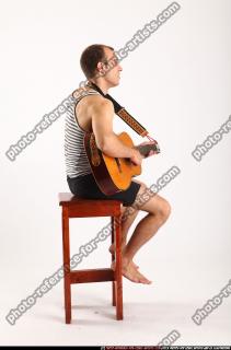 2010 08 FRANKIE SITTING PLAYING GUITAR 03