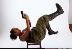 Woman Adult Athletic Black Fighting with gun Moving poses Army