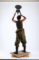 Woman Young Athletic Black Throwing Standing poses Army