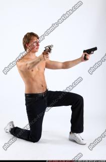 patrick-kneeling-dual-pistols
