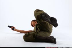 Woman Young Athletic Black Fighting with gun Laying poses Army