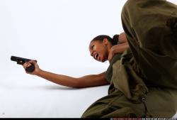 Woman Young Athletic Black Fighting with gun Laying poses Army