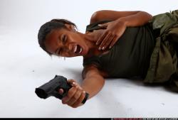 Woman Young Athletic Black Fighting with gun Laying poses Army