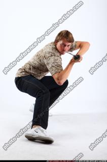 2010 10 PATRICK KNEELING KATANA DEFEND POSE 06.jpg