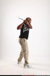 Man Old Average Black Fighting with sword Standing poses Casual