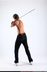 Man Young Athletic White Fighting with sword Standing poses Pants