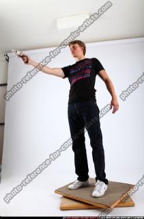 2010 11 PATRICK STANDING SHOOTING REVOLVER POSE2 01 C