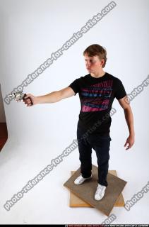 2010 11 PATRICK STANDING SHOOTING REVOLVER POSE2 01 A