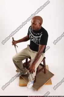 Gael Casaus-sitting-sword