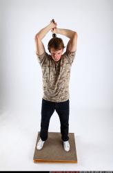 Man Young Athletic White Fighting with sword Standing poses Casual