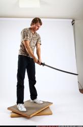 Man Young Athletic White Fighting with sword Standing poses Casual