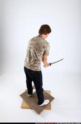 Man Young Athletic White Fighting with sword Standing poses Casual