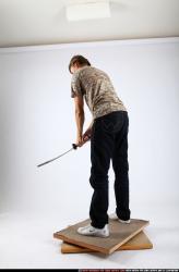 Man Young Athletic White Fighting with sword Standing poses Casual