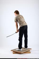 Man Young Athletic White Fighting with sword Standing poses Casual