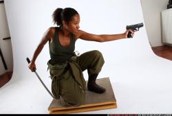 Woman Young Athletic Black Fighting with gun Kneeling poses Army