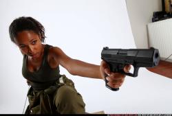 Woman Young Athletic Black Fighting with gun Kneeling poses Army