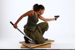 Woman Young Athletic Black Fighting with gun Kneeling poses Army