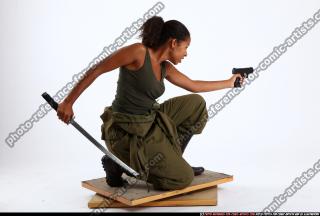 2010 12 JENNA KNEELING KATANA PISTOL 07