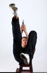 Man Young Athletic White Fighting with gun Moving poses Pants