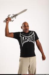 Man Old Chubby Black Fighting with sword Standing poses Casual