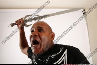 Gael Casaus-threatening-sword