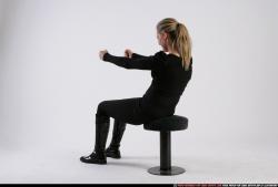 Woman Adult Athletic White Daily activities Sitting poses Casual
