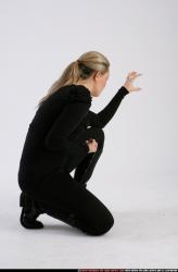 Woman Adult Athletic White Neutral Kneeling poses Casual