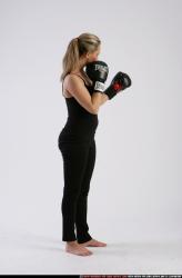 Woman Adult Athletic White Fist fight Standing poses Sportswear