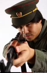 Man Adult Average Fighting with submachine gun Detailed photos Army Asian