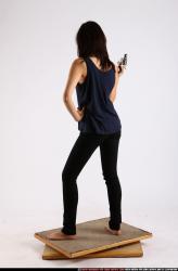 Woman Young Athletic Fighting with gun Standing poses Casual Asian