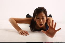 Woman Young Athletic Neutral Laying poses Casual Asian