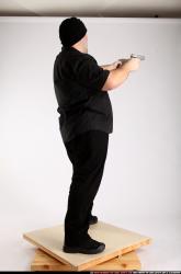 Man Adult Average White Fighting with gun Standing poses Casual