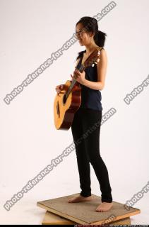 naomi-playing-guitar