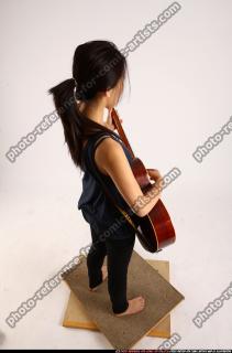 naomi-playing-guitar