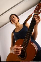 naomi-playing-guitar