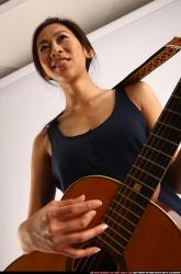 naomi-playing-guitar