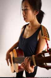 naomi-playing-guitar