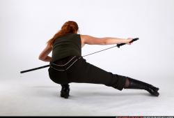 Woman Adult Athletic White Fighting with sword Kneeling poses Casual