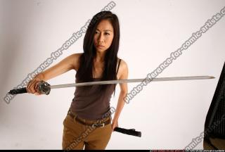 Naomi-unsheathing-sword-swing