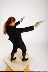 Woman Adult Average White Fighting with gun Standing poses Business