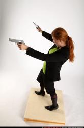 Woman Adult Average White Fighting with gun Standing poses Business