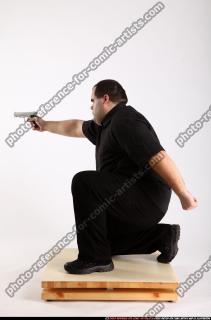 2010 08 SLAVOJ MOBSTER KNEELING AIMING PISTOL 06