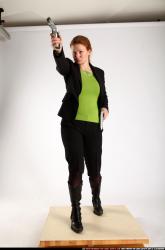 Woman Adult Average White Fighting with gun Standing poses Business