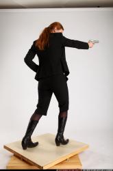 Woman Adult Average White Fighting with gun Standing poses Business