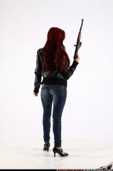 Woman Young Athletic White Fighting with submachine gun Standing poses Casual