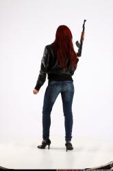 Woman Young Athletic White Fighting with submachine gun Standing poses Casual